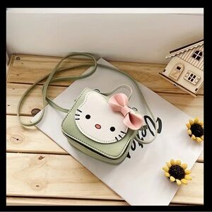 Sanrio Green and Pink Mini Bag with Cute Character Design